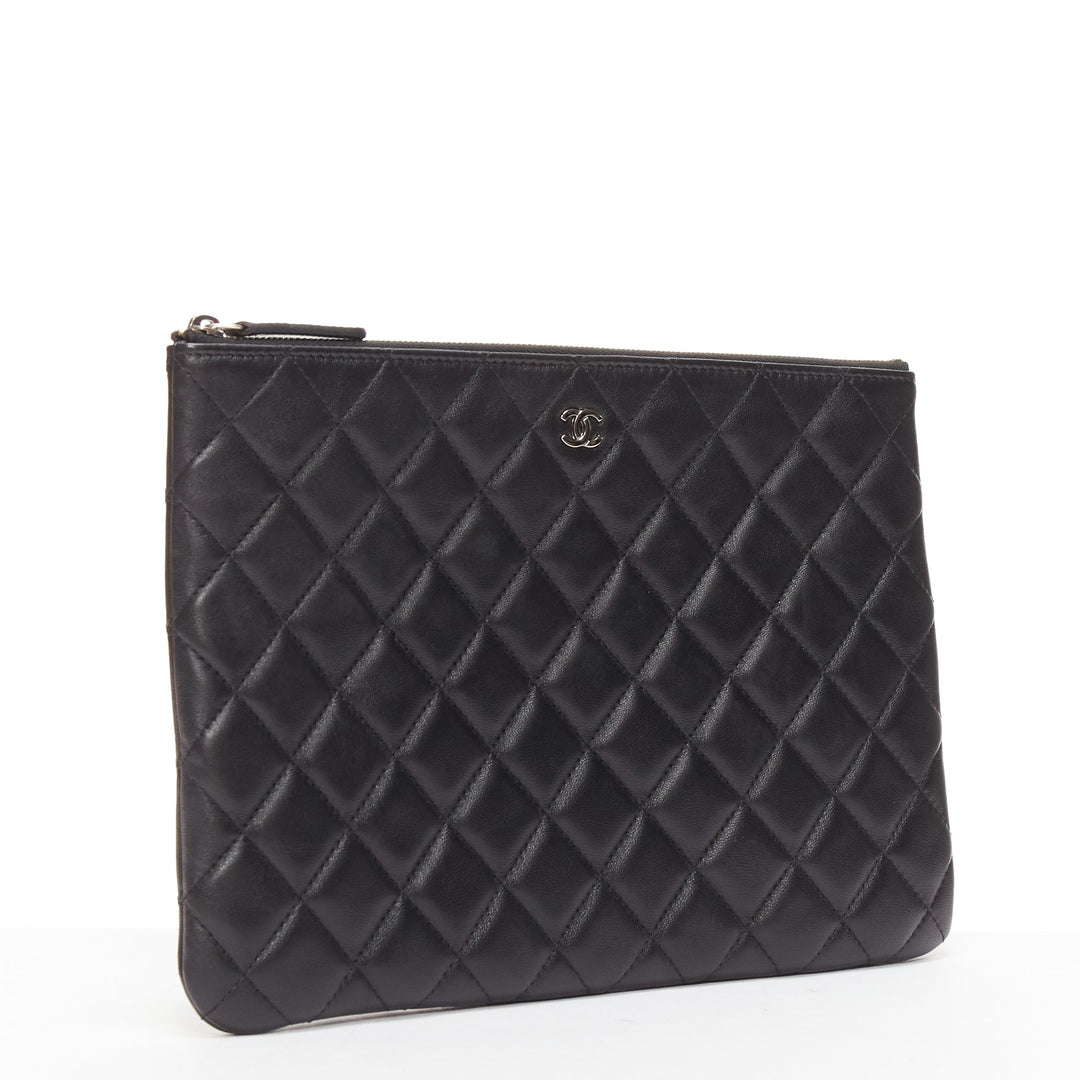 CHANEL O Case black smooth leather matelasse quilted zip clutch bag