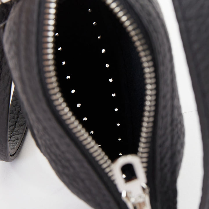 DELVAUX Pin Mini Bucket black taurillon soft leather silver hardware bag charm