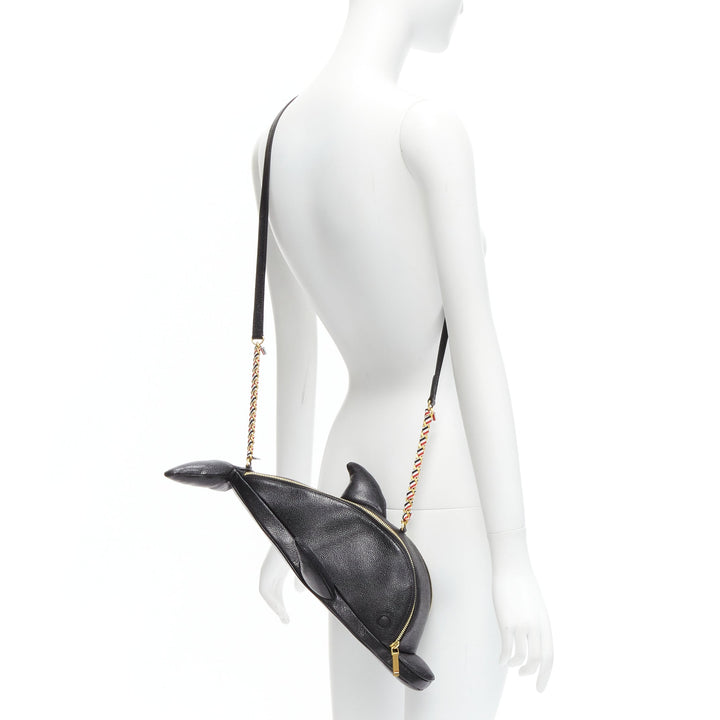 Female mannequin wearing Thom Browne by Thom Browne Dolphin Black Leather Women Bag in Size  | Available at JHROP