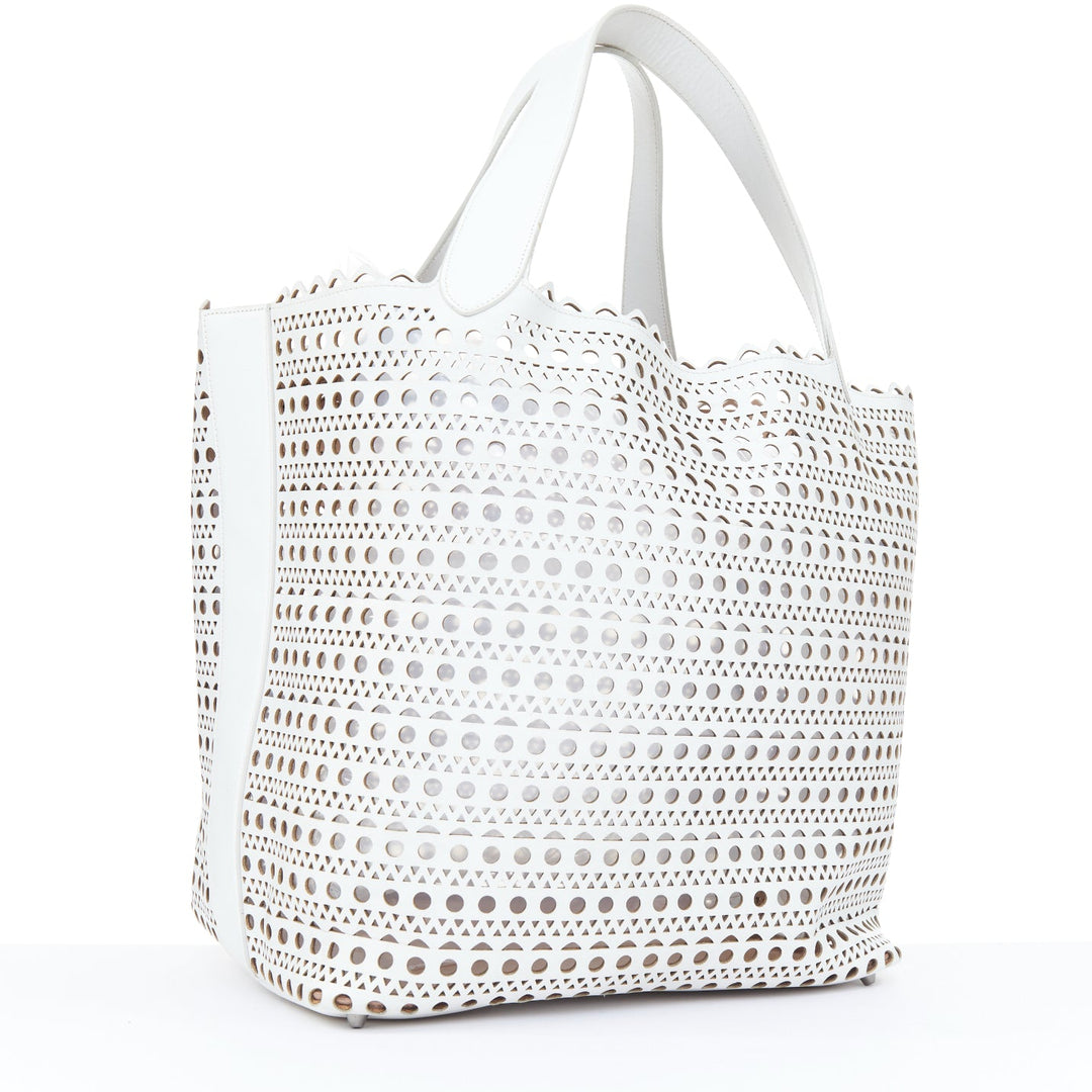 ALAIA Le Mina Vienne Wave laser cut white calfskin leather travel tote bag