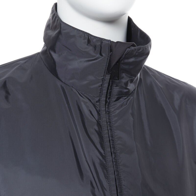 PRADA Nylon 2018 navy enamel triangle rubber logo cuff zip shell jacket IT54
