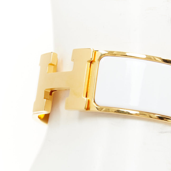 HERMES Clic H white enamel signature logo gold plated narrow cuff bracelet