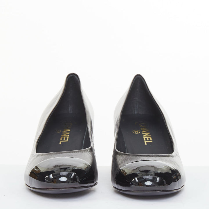 CHANEL 2021 black leather patent cap toe gold camellia block heel pumps EU39C