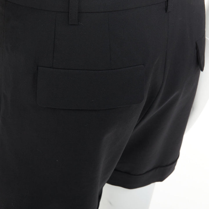 RAF SIMONS 2009 black wool mid rise tailored turn up trouser shorts EU50 L