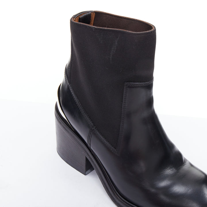 Female mannequin wearing Acne Studios Dion Black Leather Women Boots in Size EU38 | Available at JHROP