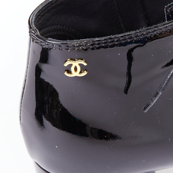 CHANEL 15A Paris-Salzburg Runway black patent gold CC lace-up ankle booties EU39