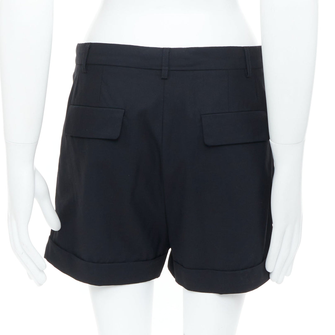 RAF SIMONS 2009 black wool mid rise tailored turn up trouser shorts EU50 L