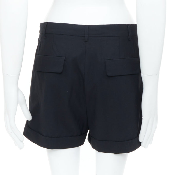RAF SIMONS 2009 black wool mid rise tailored turn up trouser shorts EU50 L