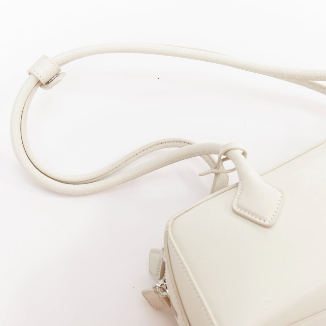 ALAIA Le Teckel Medium off white goat leather long handle east west shoulder bag
