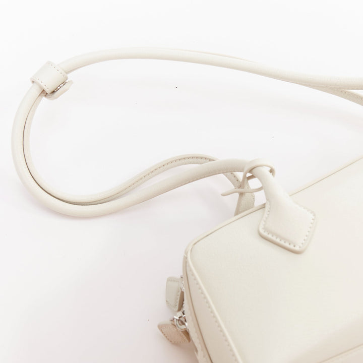 ALAIA Le Teckel Medium off white goat leather long handle east west shoulder bag