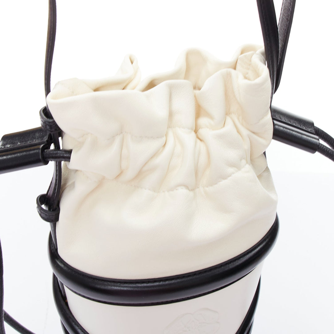 ALEXANDER MCQUEEN Soft Curve AM logo black white leather bucket bag