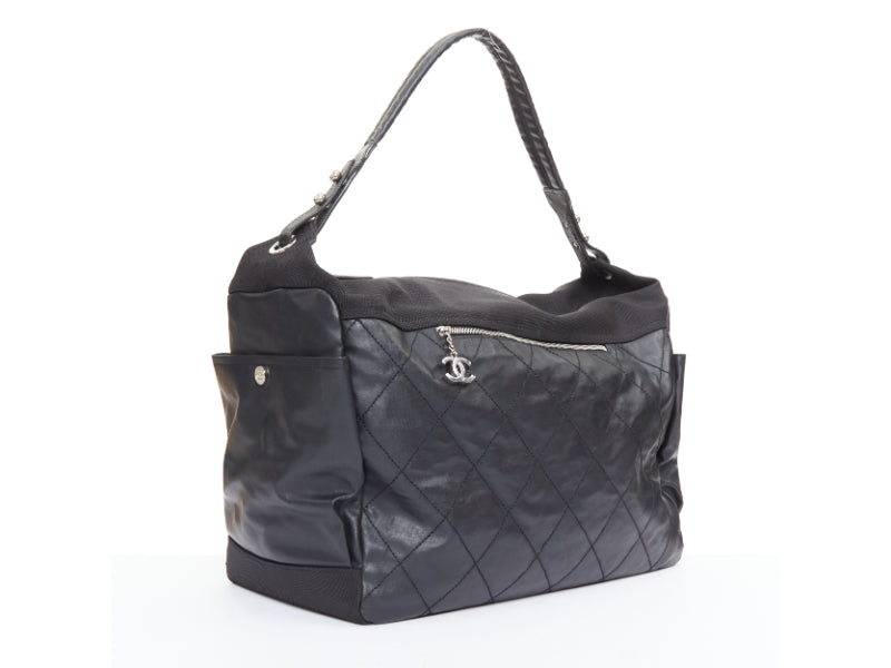 CHANEL XL Paris-Biarritz black coated canvas silver CC crossbody travel hobo bag