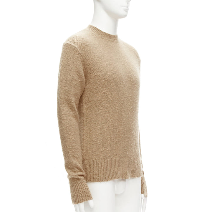 Male mannequin wearing Acne Studios Peele Beige Wool Men Sweater in Size  S | Available at JHROP