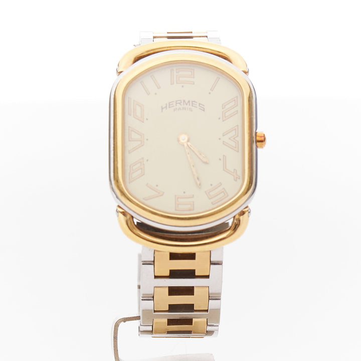 HERMES Rallye two-tone stainless steel gold plated saddle oval quartz watch