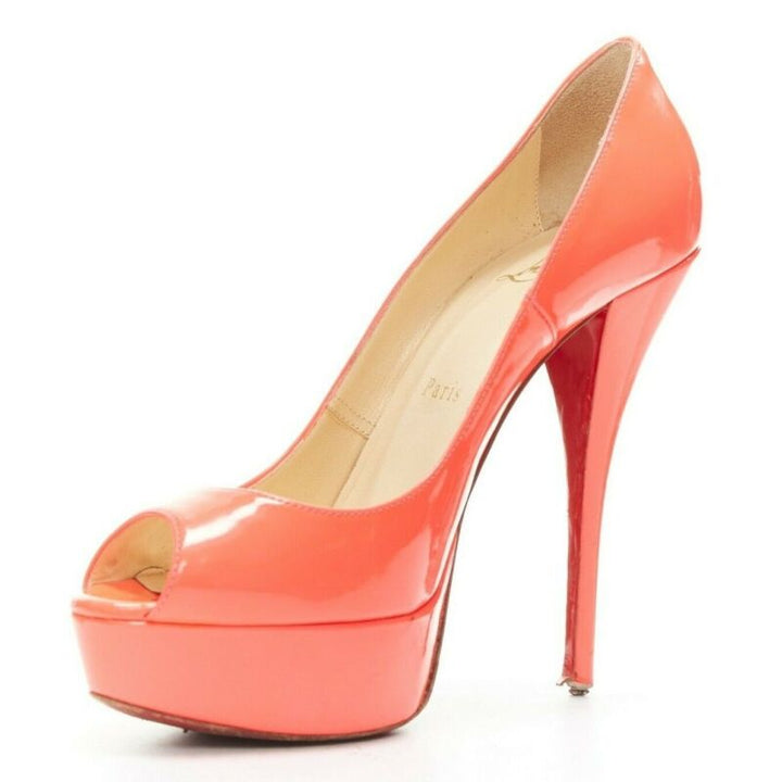 Female mannequin wearing Christian Louboutin Lady Peep 130 Pink Patent Leather Women Heels in Size EU36 | Available at JHROP