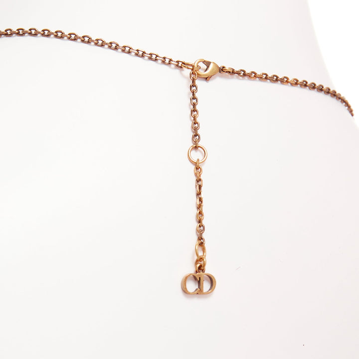 DIOR antique gold vertical logo chain CD star charm tiered necklace