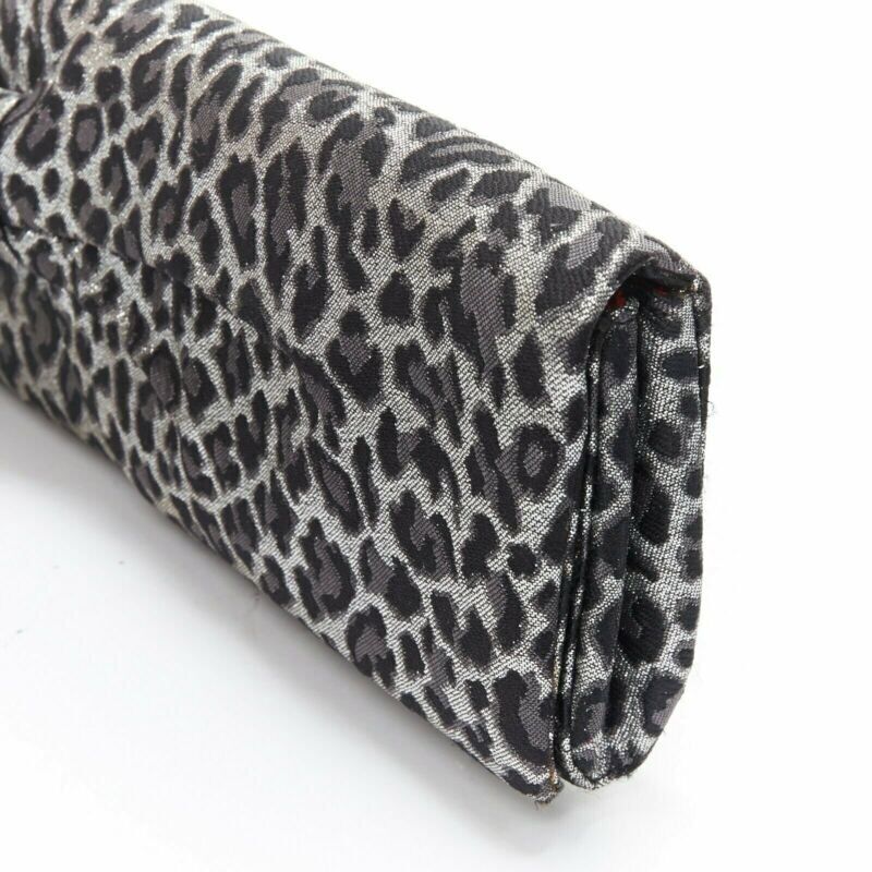 CHRISTIAN LOUBOUTIN Aionoeud silver leopard asymmetrical bow elongated clutch