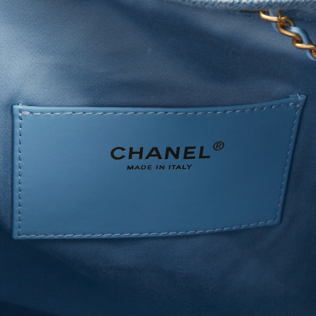 CHANEL Runway 25 Small light blue washed denim gold hardware bucket hobo bag