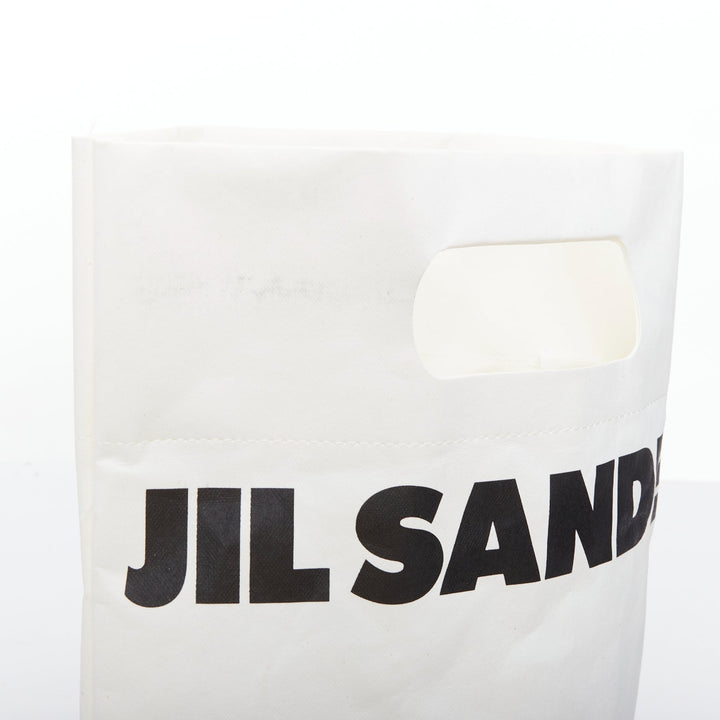 JIL SANDER cream black laminated paper logo crossbody tote bag