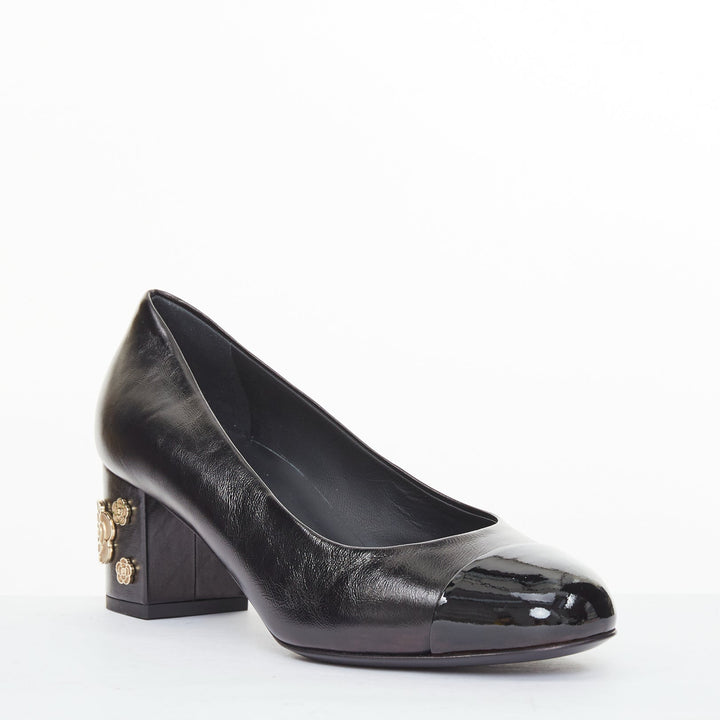 CHANEL 2021 black leather patent cap toe gold camellia block heel pumps EU39C