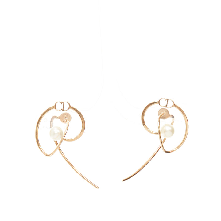 DIOR Tribales gold metal CD logo faux pearl swirl pin earrings Pair