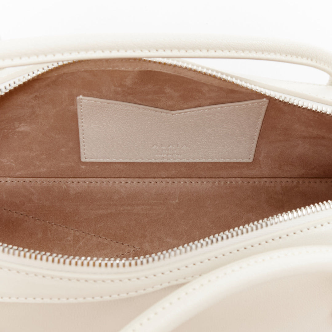 ALAIA Le Teckel Medium off white goat leather long handle east west shoulder bag