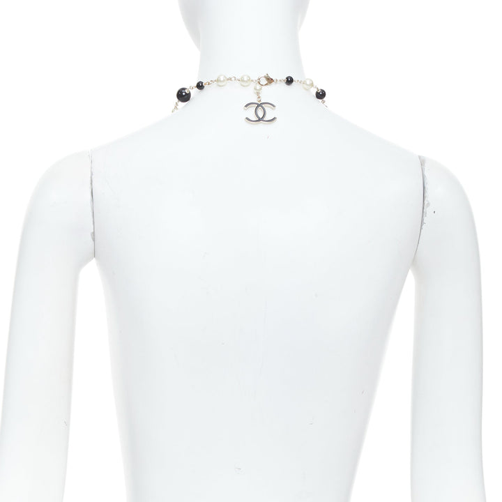 CHANEL 10C Runway CC Logo Faux Pearl Sautoir coco figurine charm necklace