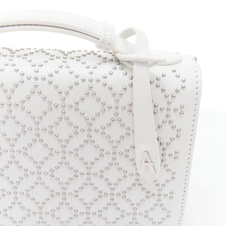 ALAIA Arabesque Franca white silver studded crossbody bag