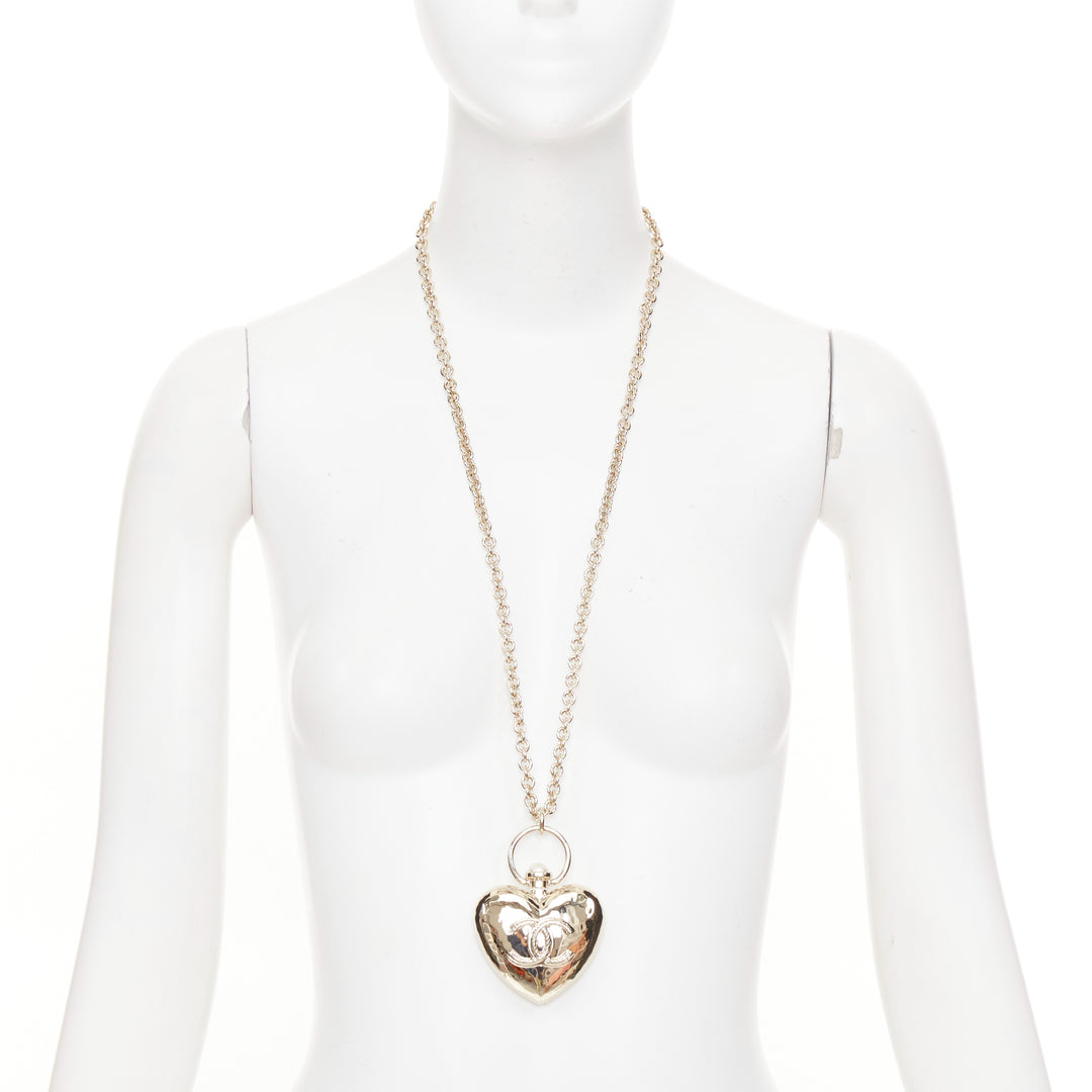 CHANEL B22C AB7531 Giant Heart Locket gold plated CC locket long chain necklace