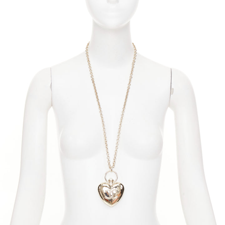 CHANEL B22C AB7531 Giant Heart Locket gold plated CC locket long chain necklace