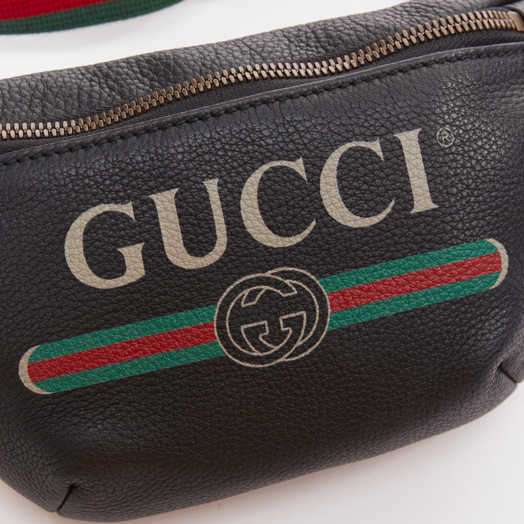 GUCCI  Alessandro Michele black vintage logo print web small crossbody belt bag