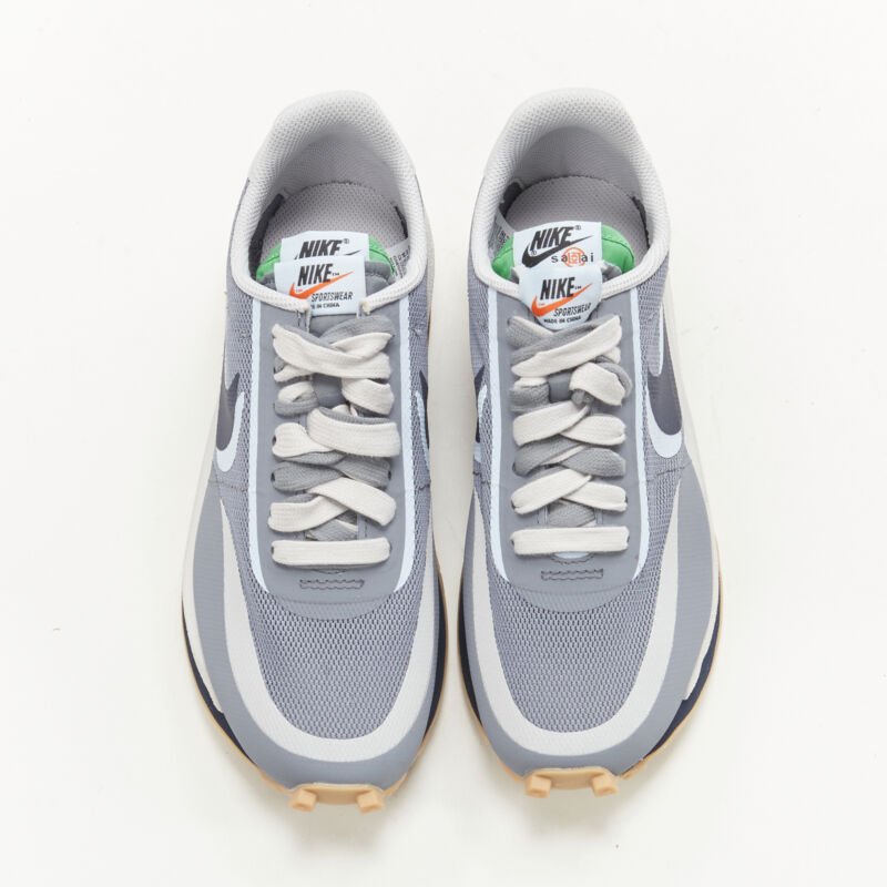 Female mannequin wearing Nike by Chitose Abe Clot Collaboration Grey Fabric Women Sneakers in Size US5 | Available at JHROP