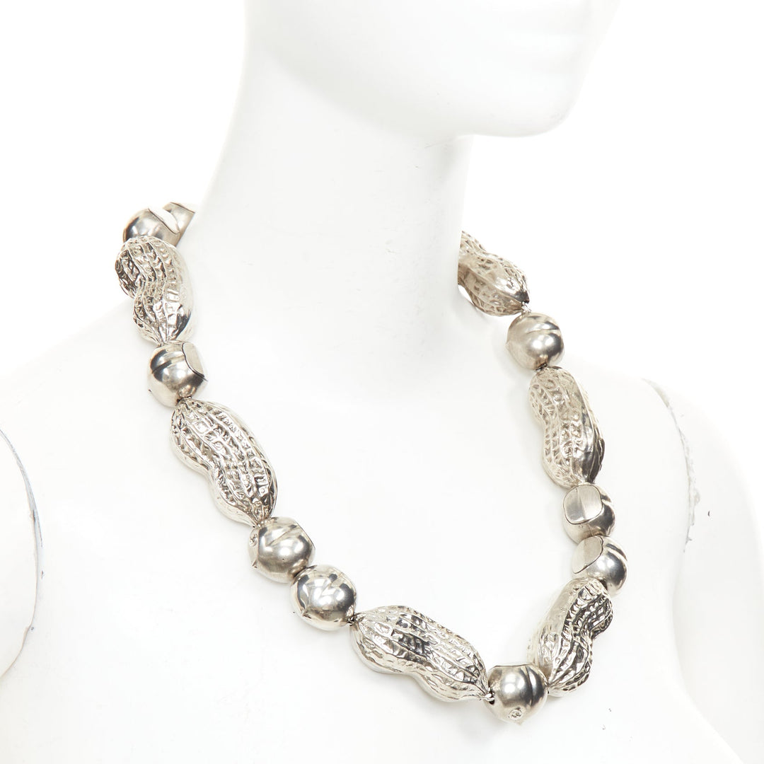 GUCCI Runway hazelnut peanut charm textured interlocking GG silver tone necklace