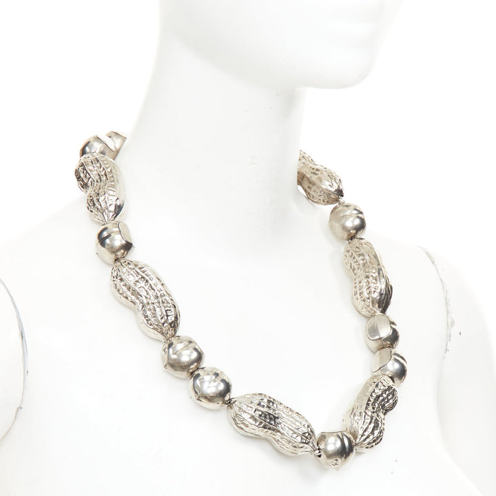 GUCCI Runway hazelnut peanut charm textured interlocking GG silver tone necklace