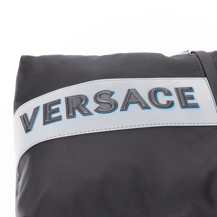 VERSACE reflective logo black nylon Greca sports strap sling crossbody bag