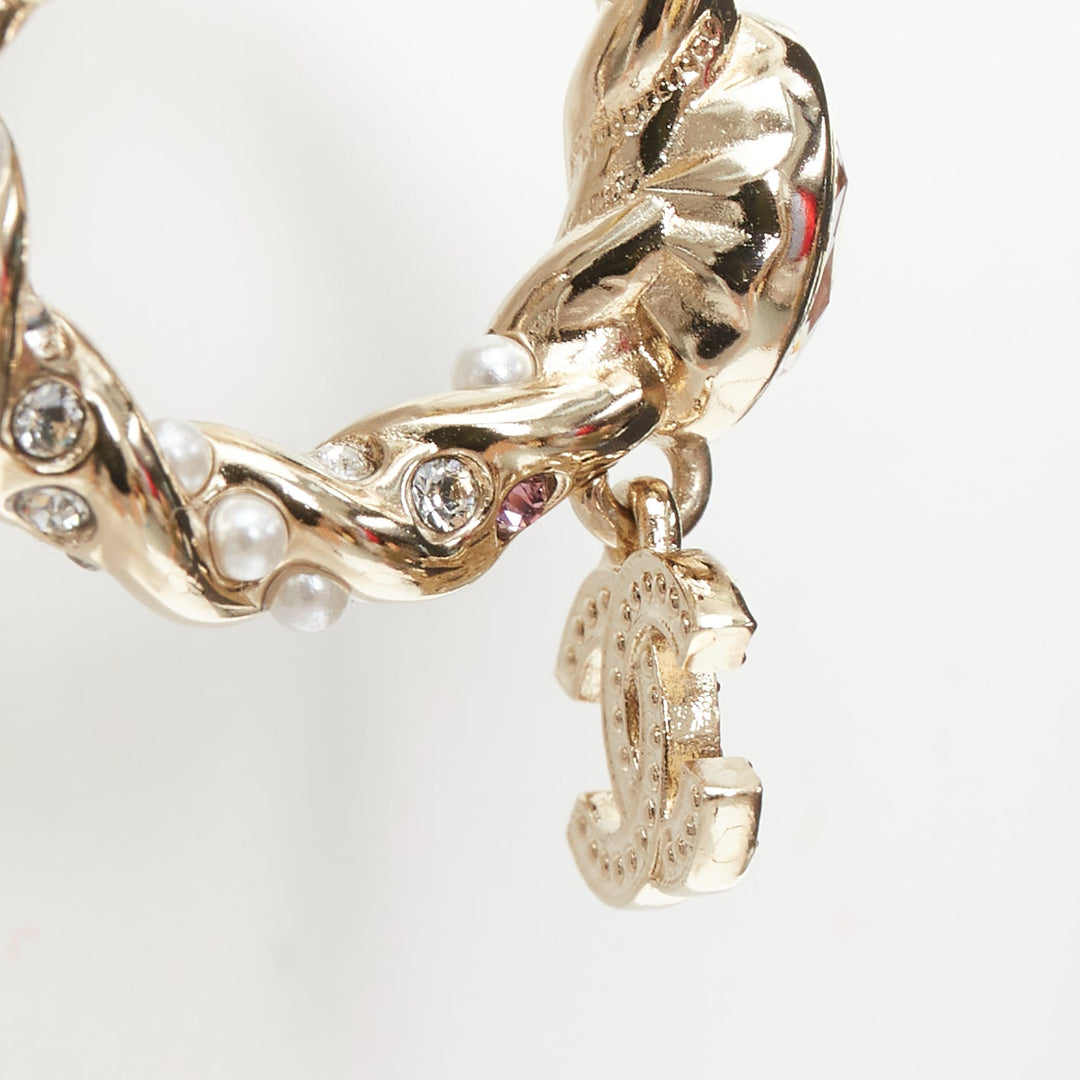 CHANEL 2023 Runway pink stone twisted chain CC crystal rhinestone hoop earrings
