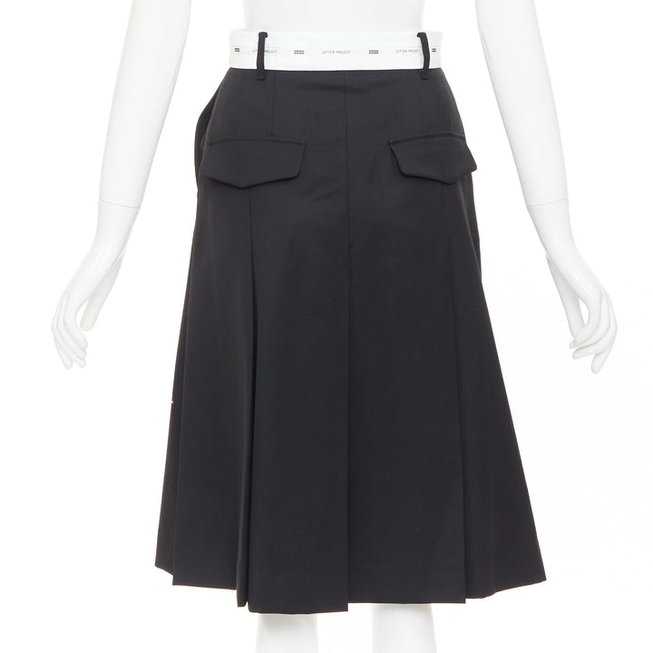 EENK LETTER X black white wool blend logo waist box pleat knee skirt XS