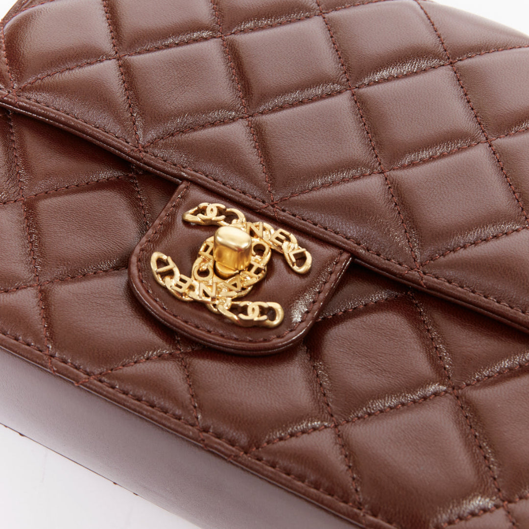 CHANEL 2023 burgundy quilted lambskin ornate CC turnlock seasonal mini flap bag