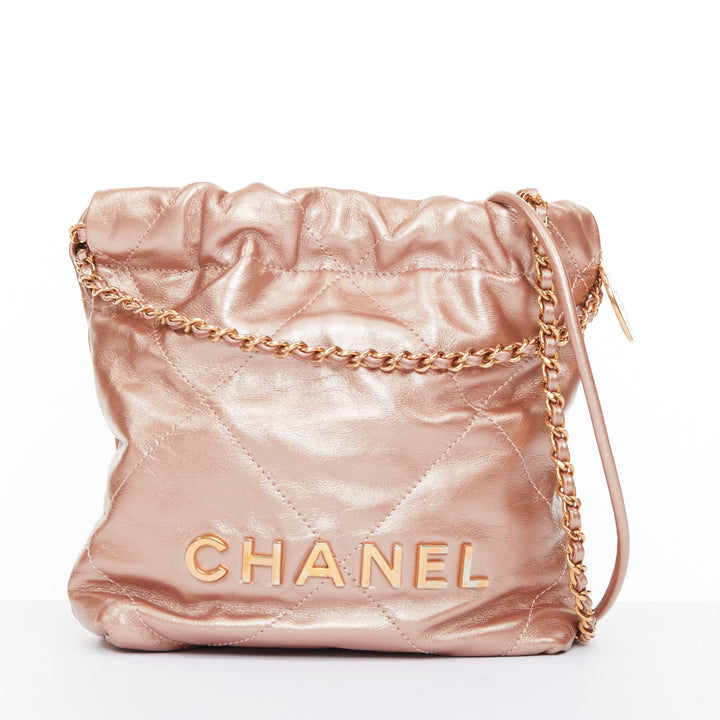 CHANEL 2023 Runway 22 Mini rose gold metallic calfskin leather drawstring bag