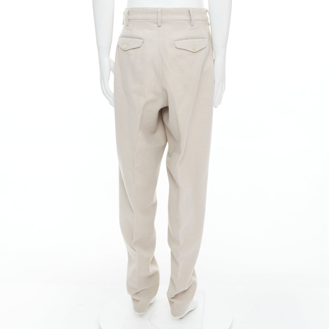 Male mannequin wearing Yohji Yamamoto Beige Wool Men Pants in Size  L | Available at JHROP