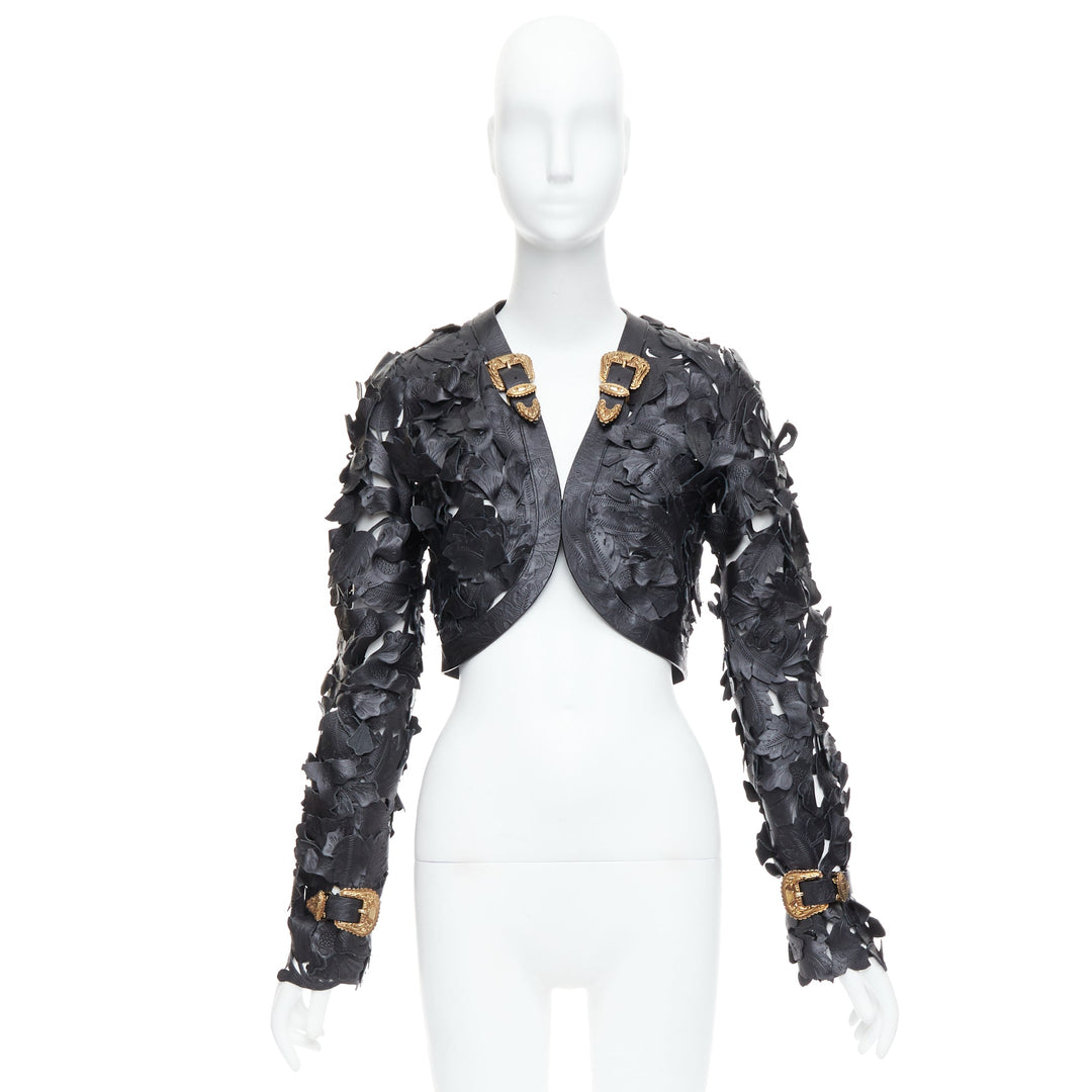 Female mannequin wearing Alexander McQueen by Sarah Burton Spring Summer 2011 Look 15 Runway Black Leather Women Cropped Jacket in Size IT40 | Available at JHROP