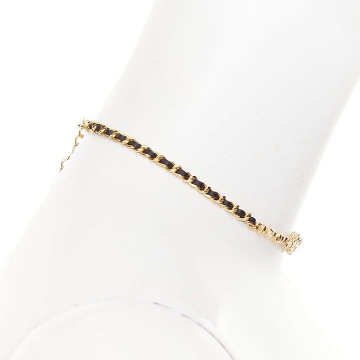 CHANEL I23A gold-tone CC  crystal strass pave black leather choker necklace