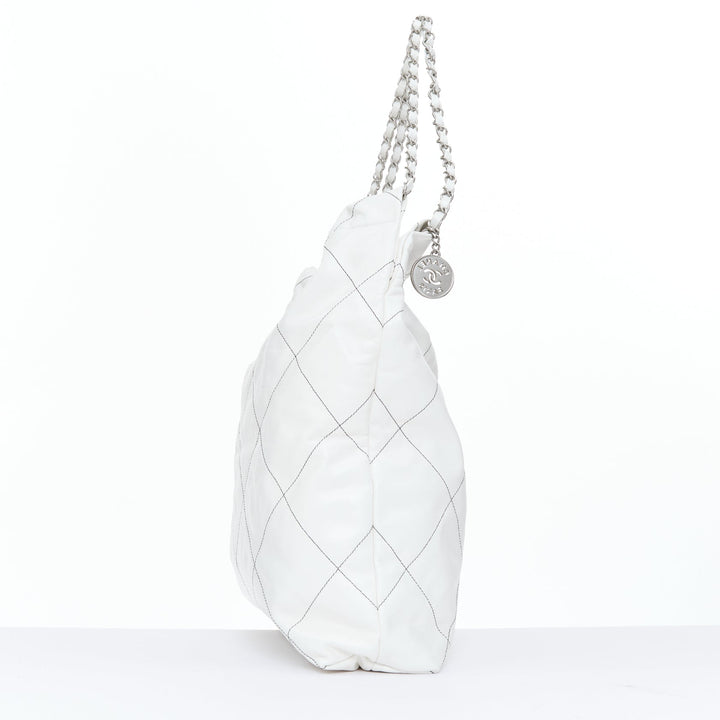 CHANEL 2022 Runway 22 Medium white quilted shiny calfskin silver hobo bag