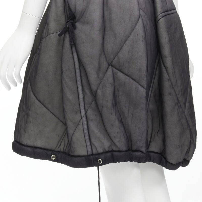 Female mannequin wearing Comme Des Garcons by Rei Kawakubo 1990 Black Nylon Women Skirt in Size  M | Available at JHROP