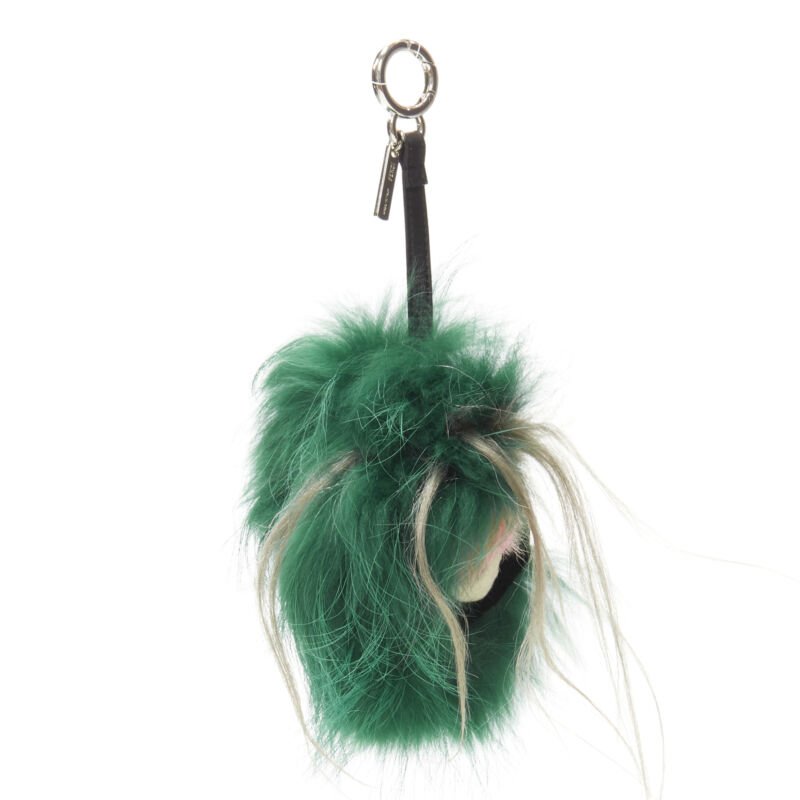  mannequin wearing Fendi Monster Bug Green Fur Key Chain in Size  | Available at JHROP