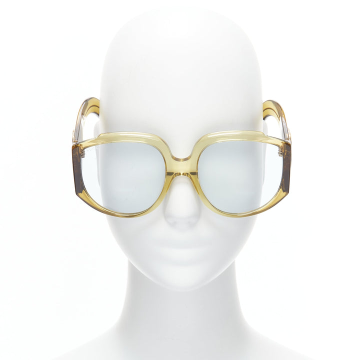 Female mannequin wearing Gucci by Alessandro Michele GG0151S Green Acetate Women Sunglasses in Size  | Available at JHROP