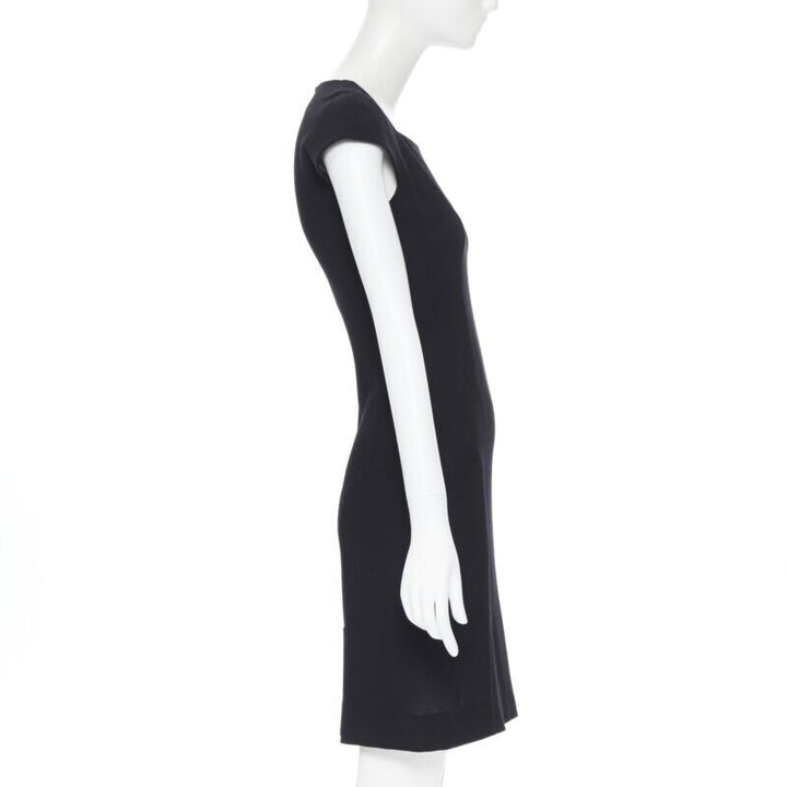 Female mannequin wearing Yves Saint Laurent by Stefano Pilati Sheath dress Black Wool Women Cocktail Dresses in Size FR36 | Available at JHROP