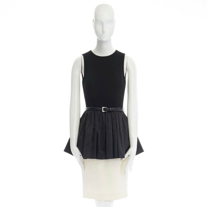 Female mannequin wearing Michael Kors Black Virgin Wool Women Skirt in Size US2 | Available at JHROP