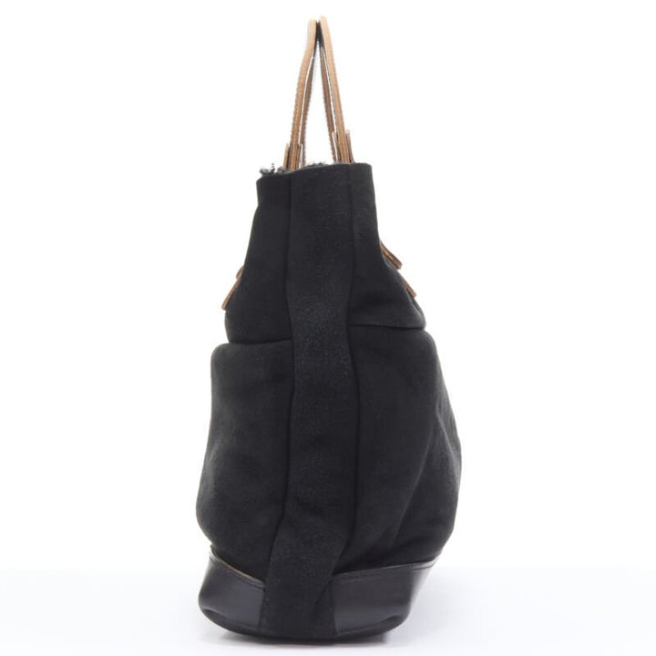 Female mannequin wearing Marni Shearling tote Black Leather Women Bag in Size  | Available at JHROP