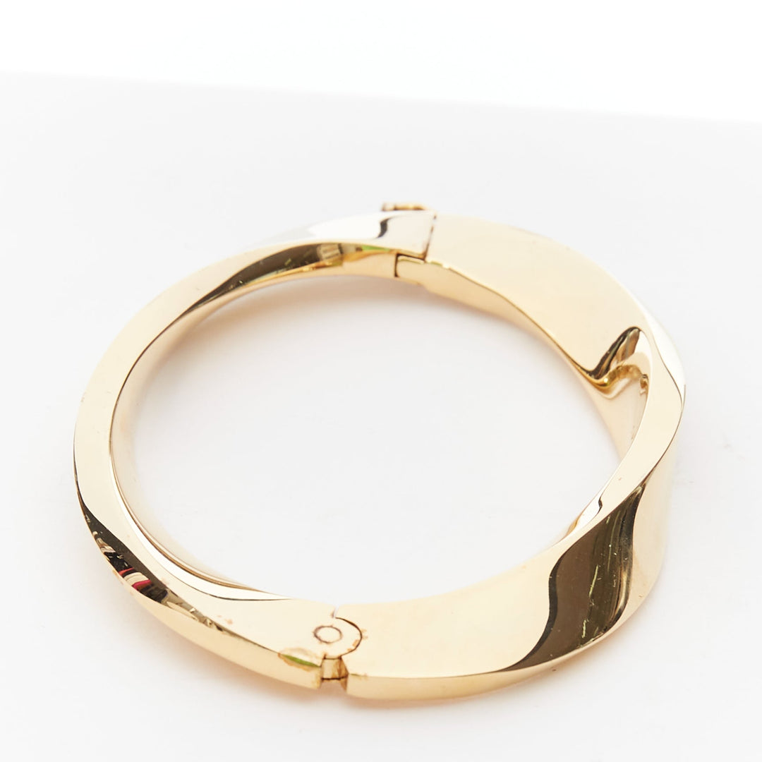 SAINT LAURENT Twisted gold double push clasps hard bangle